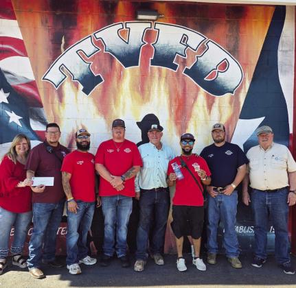 The 100 Club of the Texas Panhandle present a donation to the Tulia Fire Department