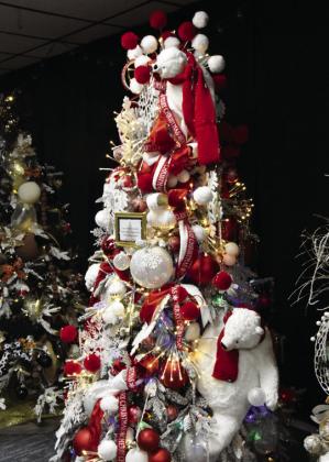 POLAR BEAR CHEER—No ice floes, but a cheerful Christmas Tree for polar bears to perch in with the Deaf Smith /Chamber of Commerce tree at this year’s Festival Gala. (Photo by Jim Steiert)