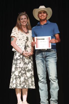 Kari Wardlaw presented the History Award to Aiden Marquez.