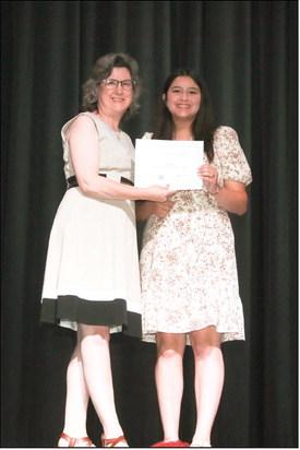 Mrs. Charlotte Howard presented Brianna Evans her National Healthcareer Association (nha) certificate for Certified Patient Care Technician Assistant.