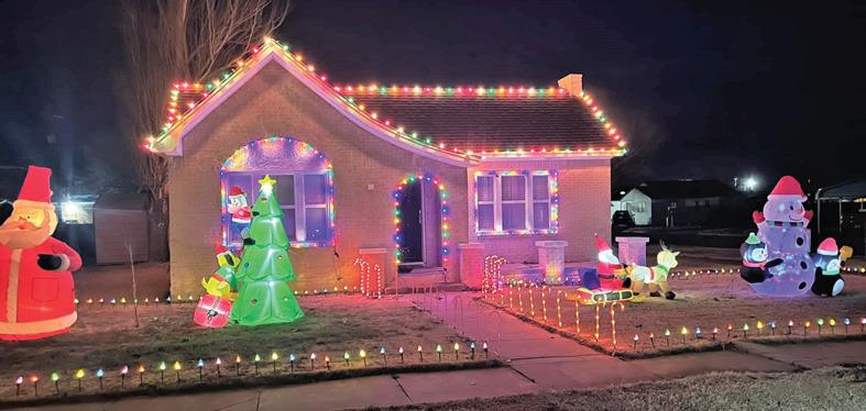 The Chamber of Commerce announced that Andres Navarro III on Jones Street is the winner of the Most Festive Yard Award. Navarro won $100 in Dimmitt Dollars for all his holiday decorating.