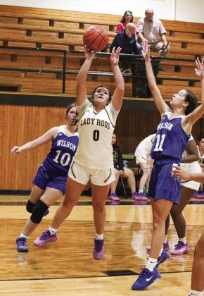 Lindsey Fernandez gets past the defenders