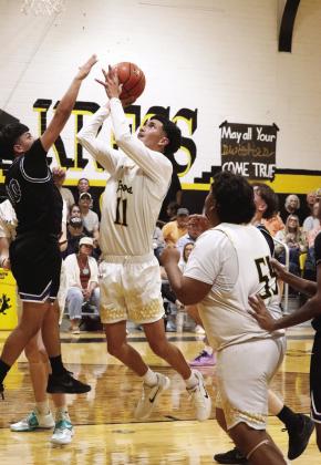 Kingston Brumley shoots over the defender
