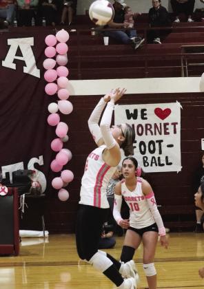 Marleigh Russell sets the ball