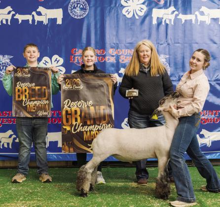 Rylee Scholz is pictured with her Reserve Grand Champion Lamb at this year's Castro County Junior Livestock Show.