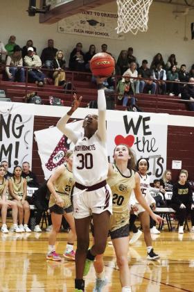Curslynn Shivers takes the ball to the basket