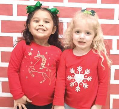 RES students get green and red for Day 1 of the 12 days of Christmas.