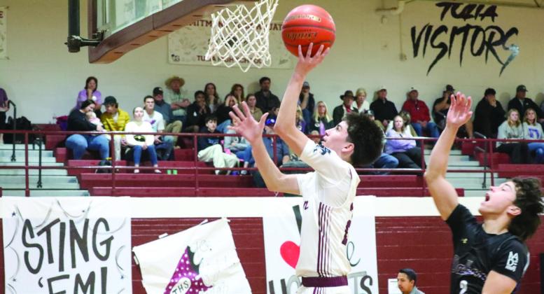 Zaiden Jalomo takes the ball to the basket