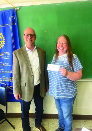 Rotary gave a donation to the Swisher Area Foundation for the upcoming 250th Anniversary 4th of July Celebration. Accepting the donation from Robert Bazemore is Debbie Bales from the Swisher Area Foundation.