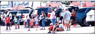 Several hundred people lined the streets as a lengthy Harvest Day Parade showed off creativity, first responders, pageant entries, school and church organizations.