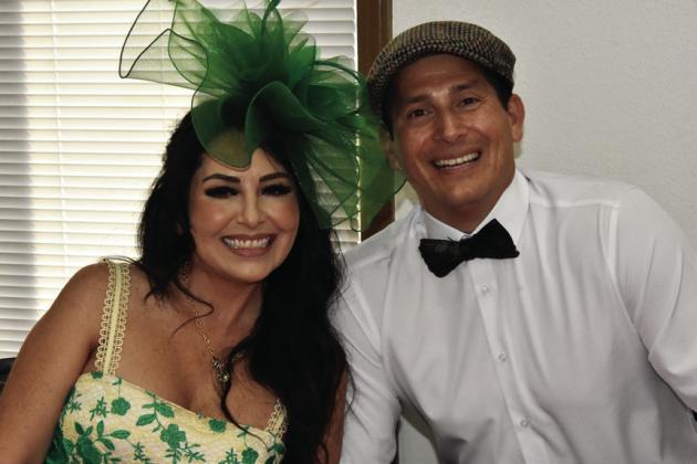 BEST HATS--Rita and Isaac Walker were quite the pair with their headwear selections for Kentucky Derby day at the Hereford Senior Citizens Center May 2 with shade of green and a snappy look together during the festivities. (Photo by Jim Steiert)