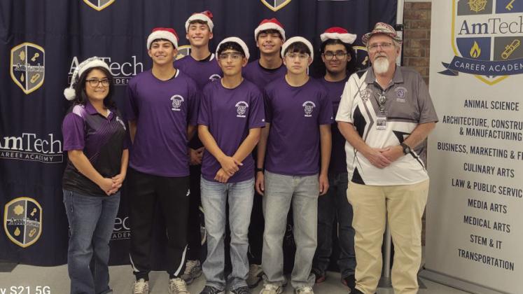 (Left to right) Mrs. Rocio Morales, Baylor Navarro, Rudy Fuentes, Yandel Sanchez, Keenan Hernandez, Diego Duenes, JJ Rodriguez, Mr. Don Bell. This team is in 7th place, remaining inside the critical top eight cutoff required to move forward. Their steady growth since the first meet reflects their dedication to improving both robot performance and match strategy.