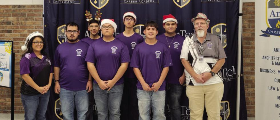 (Left to right) Mrs. Rocio Morales, Emilio Diaz, J’brien Rojas, Pedro Suarez, Brandon Sanchez, Dominik Navarro, Roy Anes, Mr. Don Bell. This team is currently ranked 10th, has shown impressive improvement and sits just outside the advancement range. Coaches and mentors have praised the team’s adaptability and resilience as they work hard to break into the top eight.