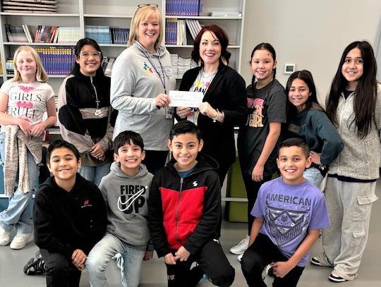 The RES Student Council raised money during their Hat Days during Christmas to donate to Snack Pak 4 Kids.