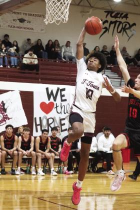 CJ Parker goes up for a Dunk!