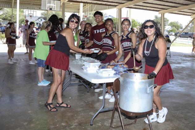 Tulia Cheerleaders served BBQ meals at the Picnic lunch
