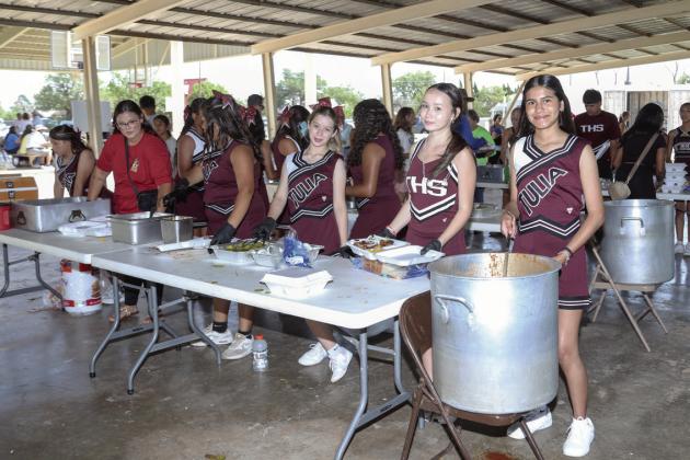 Tulia Cheerleaders served BBQ meals at the Picnic lunch