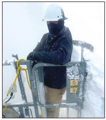 Xcel employee Mike Harz is among the many who have continued to work through the pandemic as well during the severe winter weather storm.