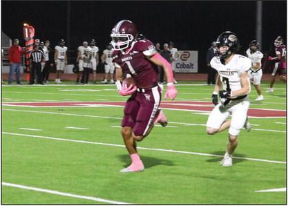 Logan Becerra makes a catch and run for a touchdown