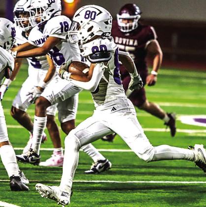 DHS Bobcat Jadrian Herrera scrambles down the field to gain yardage against Bovina.