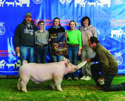 Autumn Birkenfeld is pictured with her Breed Champion York.