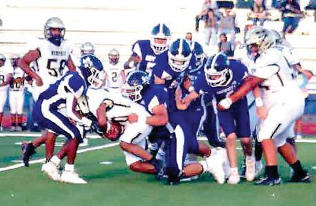 The Bobcats defense shuts down a Memphis rusher during last Friday’s game. (Dimmitt Sports Media photo)