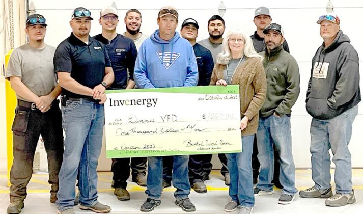 Bethel Wind Energy Center/Invenergy made a $1,000 donation to the Dimmitt VFD last Wednesday following the annual Emergency Response Training for 2023. (left to right) Rodrigo Grado, Bethel O &amp;amp; M Manager Erick Avila, Alex Chavira, Andrea Aleman, Dimmitt VFD Fire Chief Corey Lane, Marco Terrones, Alvaro Sanchez, Bethel Administrative Assistant Sheryl Lewallen, Kyle Whatley, Dwayne Espinosa and Billy Martin from the Dimmitt VFD, along with the Bethel Wind Technicians.
