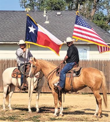 Cowboys Eloy Marquez and Alfredo Hernandez proudly carried the colors at the Hart Days Parade and Celebration.