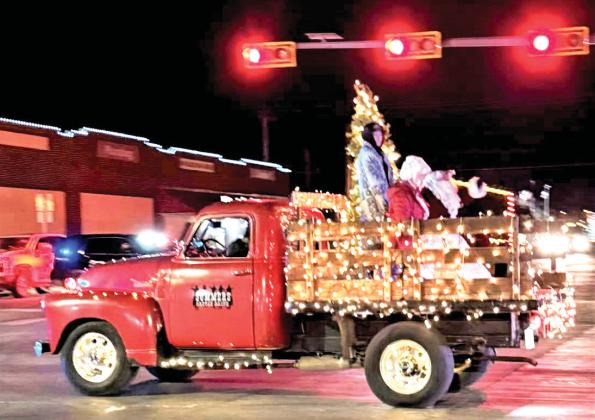 The Dimmitt Chamber of Commerce held its Christmas Light Parade to kick the holiday off. Judges for the parade were Kelly Taylor, Diane Sanders and Connie Merritt. The bright event featured winners: Best Overall- Fast Eddie’s, Rocking 13 and Van Pelt Real Estate; Shining Star- First United Bank; and Most Festive-Sixth-grade Bobcats. Children also got to enjoy Santa and Mrs. Claus for reading at West Texas Coffee and the Lions Club tree lighting.