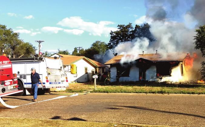 Vacant house catches fire