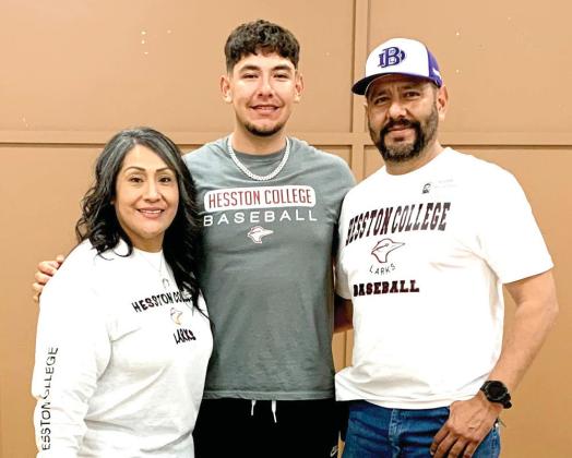 Dimmitt senior Mario Lopez signed with Hesston College in Kansas to play baseball for the Larks.