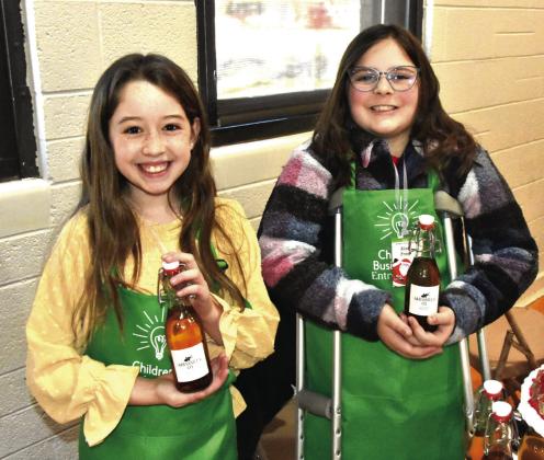 NOT PLAIN VANILLA—Blair Vallejo, 9, and Alice Prins, 10, gave away only a little of their secrets for their A&amp;amp;B vanilla packaged in neat old-fashioned bottles. The secret’s in the beans.