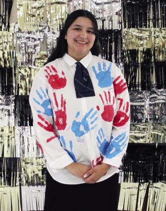 Brianna retired her jacket and showed off her shirt that all of the members had placed their hands and names on.