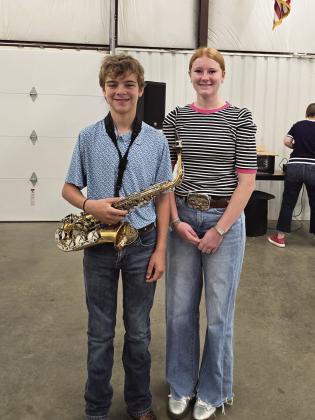 Happy 4-H Members Hudson Butler and Lynnlea Johnson helped with the Happy Memorial Day Ceremony