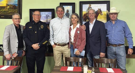 Mayor Dusty George, Police Chief Paul Brown, Tom Sell, Kyla Sell, Judge Michael Clawson and Sheriff Kyle Schmalzried at the El Camino