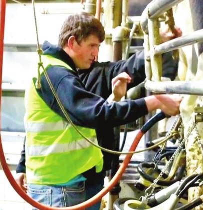 Naz Dayson Schacher gets hands-on experience during the Dairy Honors program.