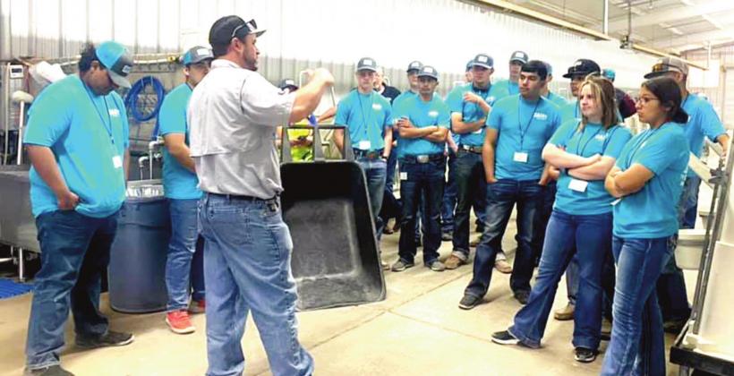 Caprock Dairy gives Naz students information on how they run their operation.