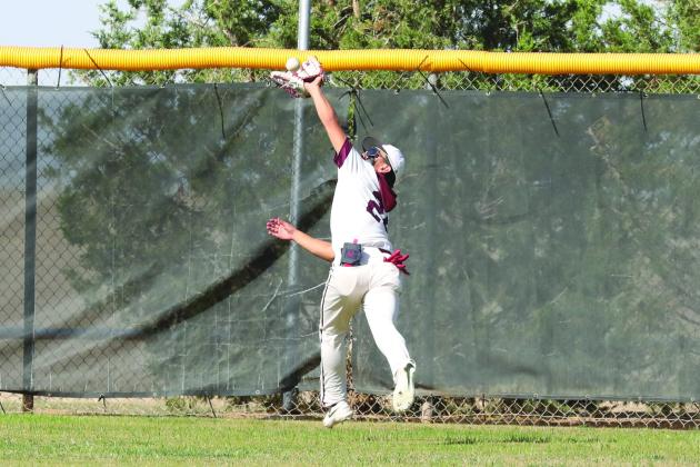 Jacob Trevino makes a catch for an out in center field