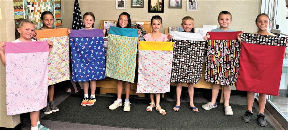 Castro County 4-Hers attended a pillowcase making workshop last Thursday morning. Eight youth attended to learn about their sewing machines, sew straight line, picked out accent and main fabrics, banding hidden seams, and French seams.