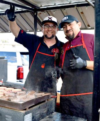 Officers cooking up some ‘law enforcement burgers” at National Night Out.