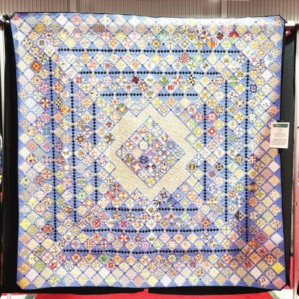 (Photo right) Ogallala Quilt Festival - Viewer’s Choice – Mama Said to Choose Just One - Made and quilted by Mary Cotton-Randall, Millbrook, Alabama
