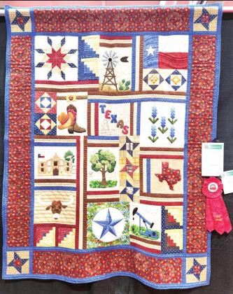 Ogallala Quilt Festival - Texas Traditions – Second Place – Amateur. Made and quilted by Geri Kuster, Amarillo.