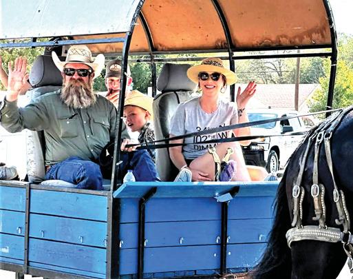 Matt and Mandy Gfeller participated in the Harvest Days Parade with their wagon and horses.