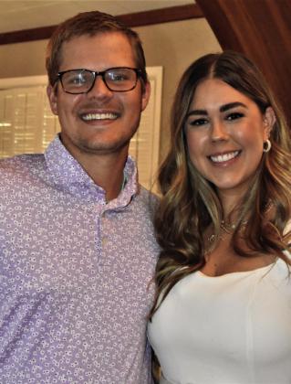 MEDIA POWER COUPLELane and Courtney Formby returned to Hereford five years ago to keep a Formby family institution, KPAN radio, broadcasting its hometown coverage. They say the community and its listeners have been great to them. (Photo by Jim Steiert)