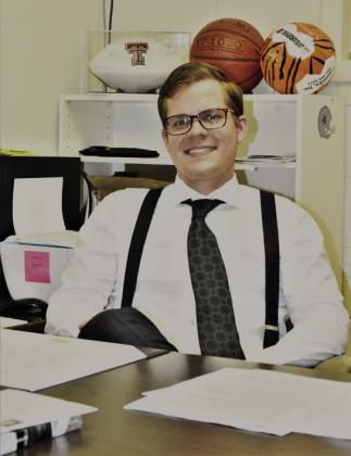 JUST LIKE POPS--When Lane Formby returned to KPAN radio in 2021 he sported dapper deja vu attire, imitating the look of his late Pops Clint Formby. Lane did his best to continue a long-standing tradition of hometown coverage being fun--as well as feeling. (Photo by Jim Steiert)