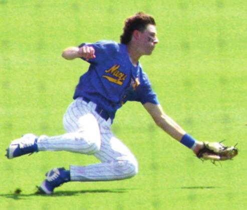 Naz fielder Tanner Birkenfeld makes flying effort the catch a ball in the final game against D’Hanis.