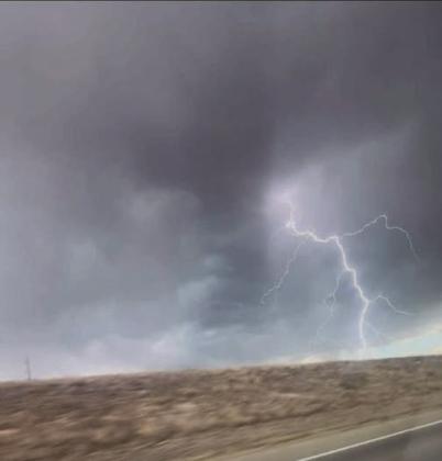 STORMY FIRE STARTER-Clouds rumbled thunder and unleashed a brief windlashed shower on Hereford May 14, then moved eastward bearing only dry lightning that sparked multiple wildfires, including the 34,000 acre Hungate Fire in Randall County that threatened Canyon and Happy.