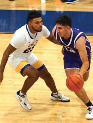 Bobcats’ Mario Lopez makes a drive around the Hale Center defense.(photo by Arnoldo Ogaz, Dimmitt Sports Media)
