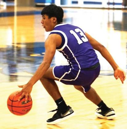 Bobcats’ Isaiah Ramirez works his way around the Hale Center defense.(photo by Arnoldo Ogaz, Dimmitt Sports Media)