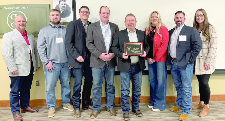DISTINGUISHED BANKING--First National Bank of Hereford president Wade Easley, (holding plaque) received the 2025 Distinguished Banking Service Award from The Bankers Agricultural Credit Conference. The honor reflects dedication to serving customers, community, and the banking profession with excellence.